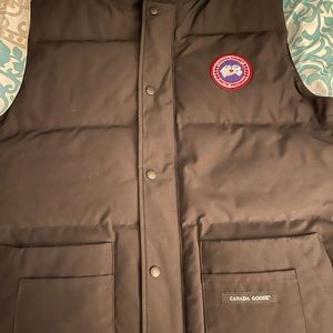 Worn 3 times black Canada Goose vest with garment bag